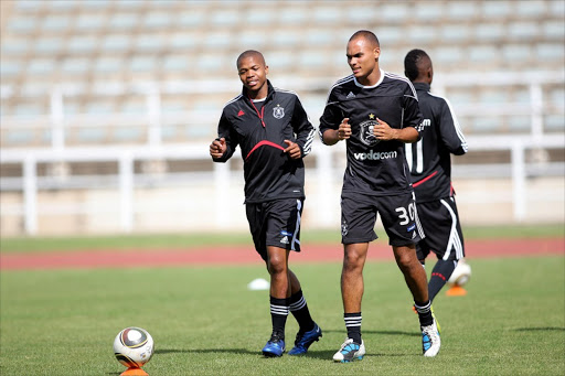 Orlando Pirates players Robyn Johannes and during the training at Johannesburg Stadium. Pic. Veli Nhlapo. 30/11/2010. © Sowetan.