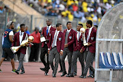 Clapham High School players, who defended the Copa Coca-Cola trophy last month,   parade the silverware during the match between Sundowns and Wits recently.   / Frennie Shivambu / Gallo Images