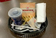 Burger King's Whopper meal with fries and a soda.