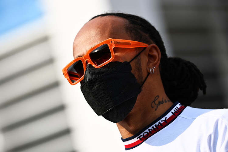 Lewis Hamilton looks on in the paddock during previews ahead of the F1 Grand Prix of Mexico at Autodromo Hermanos Rodriguez on November 4, 2021 in Mexico City, Mexico.