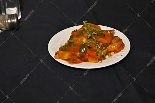 Chilli Paneer Tossed Momos [12 Pieces]