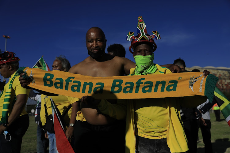 There was a jovial mood at the FNB Stadium as fans went back to live soccer for the first time since the outbreak of the Covid-19 pandemic in March last year. Picture: ALON SKUY