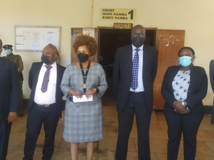Thika law courts officials led by chief magistrate Stella Atambo (centre) on Wednesday.