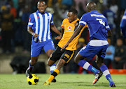 Bernard Parker of Kaizer Chiefs is challenged by Kwanda Mngonyama during the Absa Premiership match between Maritzburg United and Kaizer Chiefs at Harry Gwala Stadium. Picture Credit: Gallo Images