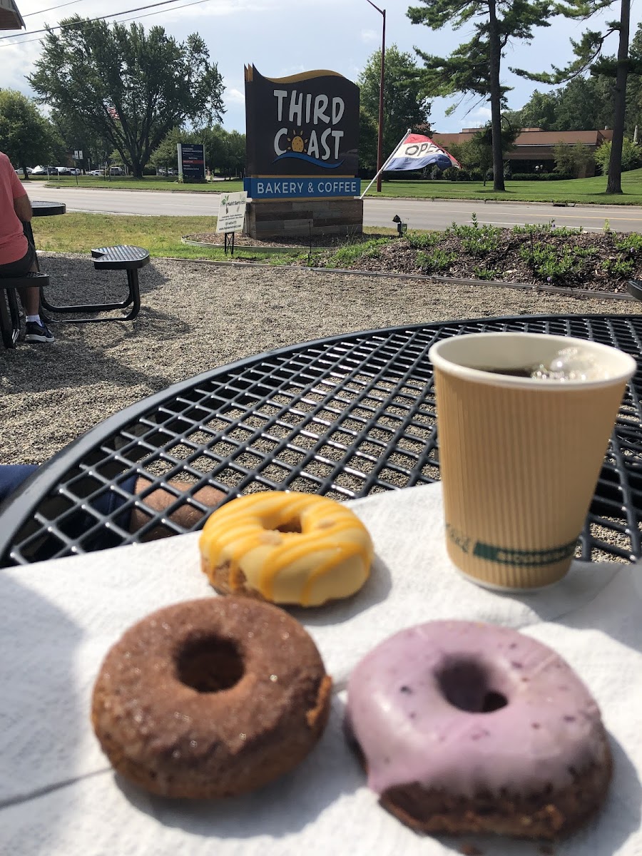 Creamsicle, pumpkin and blueberry donuts.