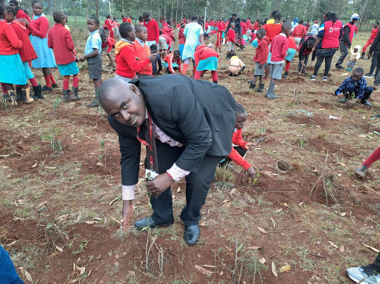 Peter Muthima, Equity bank branch manager in Kawangware Nairobi led the tree planting exercise on Friday, November 18.