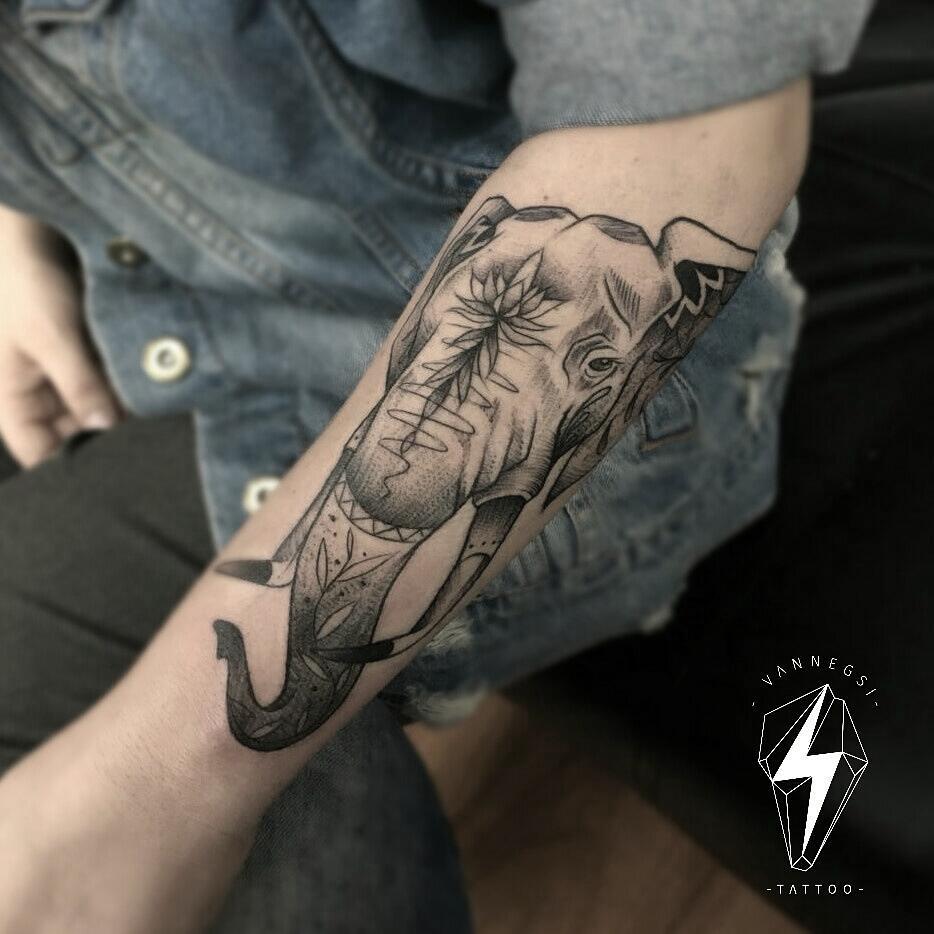 Simple Black Elephant Tattoo On Forearm