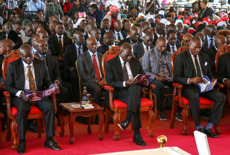 President William Ruto leads mourners at Field Marshall Mukami Kimathi's burial in Njabini, Nyandarua on May 13, 2023