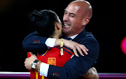 Spain's Jennifer Hermoso is embraced by president of the Royal Spanish Football Federation Luis Rubiales after the match they won the 2023 Fifa Women's World Cup Australia and New Zealand final against England at Stadium Australia in Sydney on August 20 2023. 
