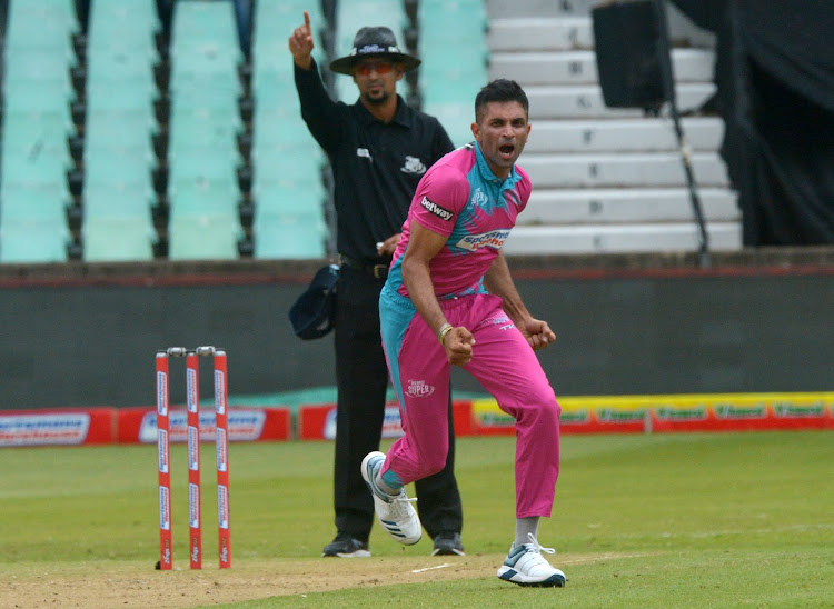 Keshav Maharaj of Durban Heat celebrates the wicket of AB de Villiers of Tshwane Spartans during the Mzansi Super League match at Kingsmead Stadium in Durban on November 21 2018.