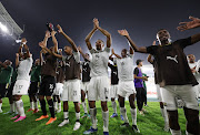 Bafana Bafana centre-back Mothobi Mvala leads the players in celebration after their 2-0 win against Morocco in San Pedro, Ivory Coast.