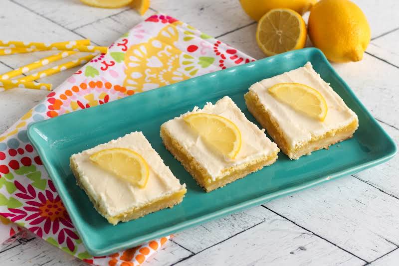 Melt In Your Mouth Lemon Bars On A Serving Platter.