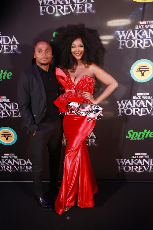 Siphiwe Tshabalala and Bokang Montjane at the premiere of Marvel Studios Black Panther: Wakanda Forever at Ster Kinekor, The Zone Rosebank Mall in Johannesburg.