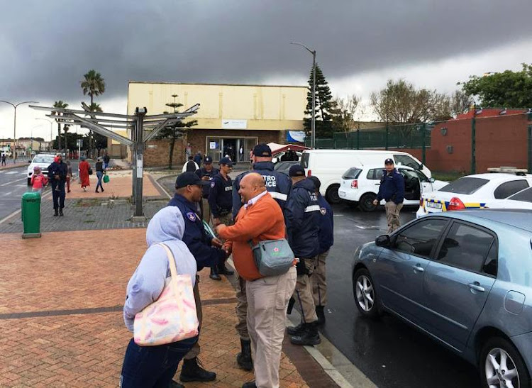 A contingent of metro police were on duty outside the Hanover Park Civic Centre polling station in Cape Town on May 8 2019.