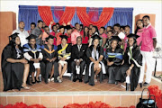 PASSIONATE MOTIVATOR: 
      Pastor Samuel Madzebe, 
      
       centre, with guests and high school pupils at The Living Gospel World Mission at Dididi in Thohoyandou 
      PHOTO: BENSON NTLEMO