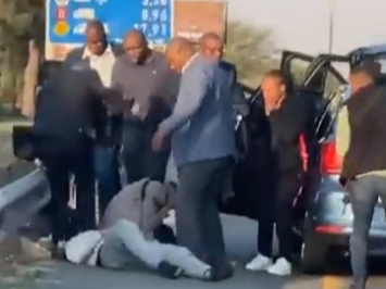 A screenshot from the video of VIP protection members assaulting a man on the N1.