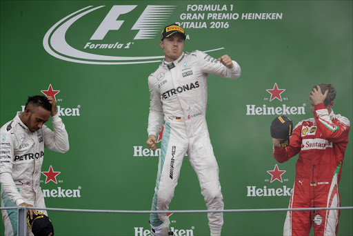 Mercedes' Nico Rosberg celebrates his win on the podium after the race. Picture ctedits: Reuters