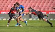 Dan du Plessis of the Stormers attempts two break two challenges in the Rainbow Cup SA match against the Lions at Ellis Park  in Johannesburg on May 15, 2021.