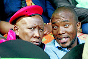 EFF president Julius Malema, left, and DA leader Mmusi Maimane. The EFF will ensure  the DA  delivers in municipalities so the ANC can be removed from power, says the writer.  Photo: ANTONIO  MUCHAVE