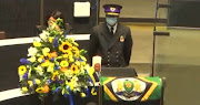 The seat occupied by Jolidee Matongo, who died in a car crash soon after becoming mayor of Johannesburg.  His seat is draped in black and a candle was lit for him and 17 other councillors who died during their terms of office.