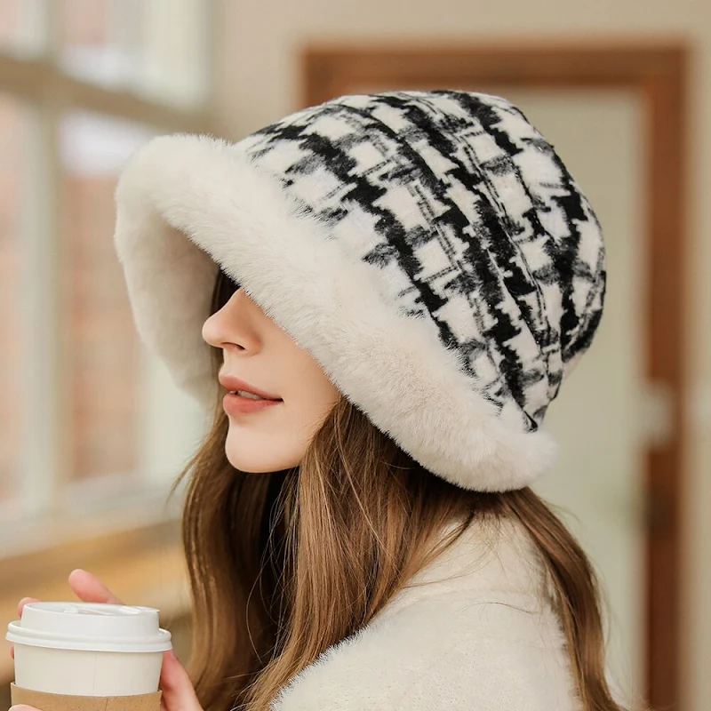 MUNDANE MYSTERIES: Why do winter hats have pom-poms on top?