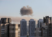 Smoke rises after a missile strike in Kyiv, Ukraine on June 26 2022. 