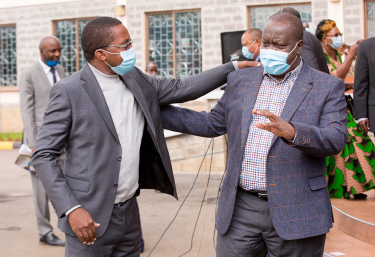 Murang'a Governor Mwangi wa Iria and Interior CS Fred Matiang'i after meeting elected leaders y on government development projects on July 3.