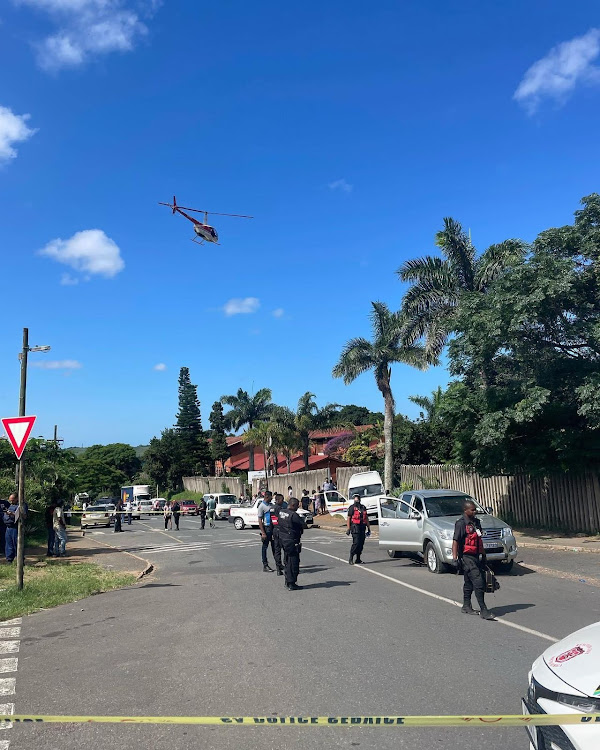 A 'taxi owner' was shot dead and a 10-year-old child injured outside Lotusville Primary School in Lotusville on Wednesday afternoon.