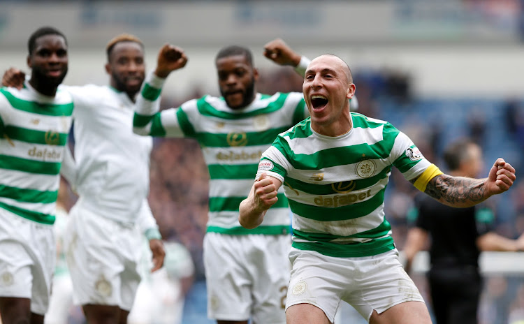 Celtic’s Scott Brown celebrates after the match