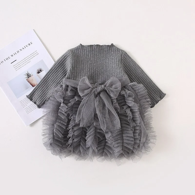Gebreide polkadot jurk voor dames, stijlvol en comfortabel. Perfect voor elke gelegenheid, accentueer je stijl met dit unieke en moderne design.