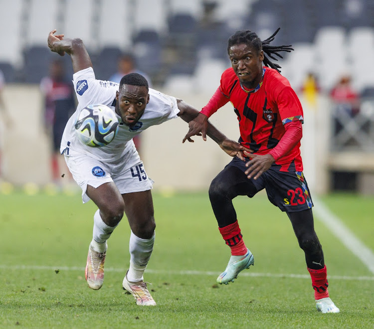 Somila Ntsundwana of Richards Bay and Marks Munyai of TS Galaxy during the DStv Premiership match at the Mbombela Stadium on Sunday in Nelspruit