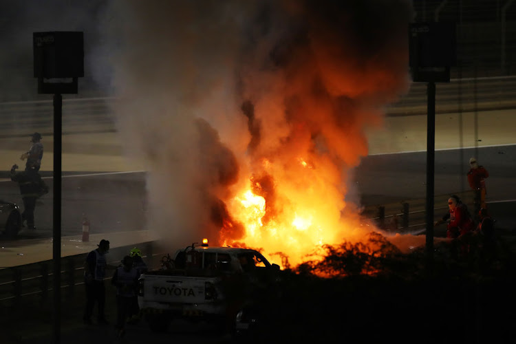 A fire is pictured following the crash of Romain Grosjean of France and Haas F1 during the F1 Grand Prix of Bahrain at Bahrain International Circuit on November 29, 2020 in Bahrain, Bahrain.