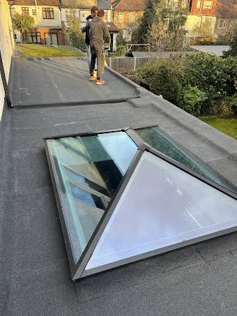 Flat roof lantern and new flat roof album cover