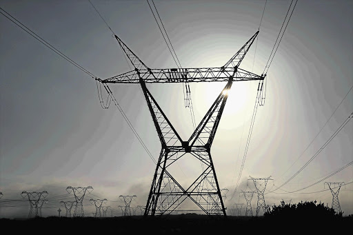 CRIPPLED GIANTS: Electricity pylons outside Koeberg nuclear power station, near Melkbosstrand on the Western Cape coast