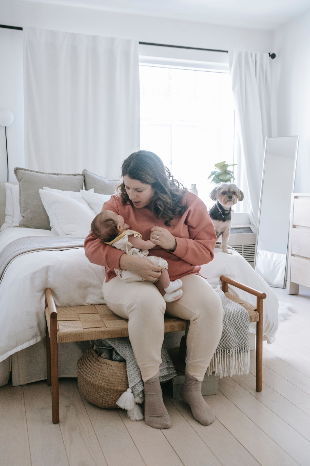 Mom + baby bonding in the bedroom
