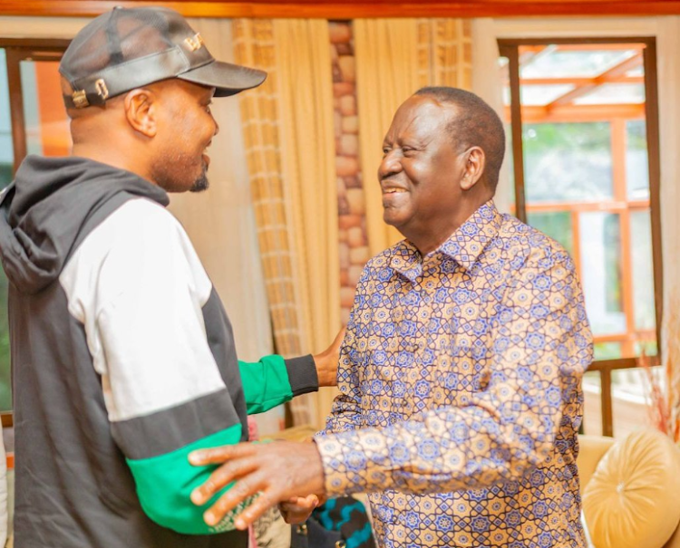 ODM leader Raila Odinga with Public Service CS Moses Kuria during a reconciliation meeting at the Odinga's Karen home on April 7, 2024.