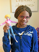 Chantal Gleason with her Alexa doll, which is part of the Malaville Dolls collection.