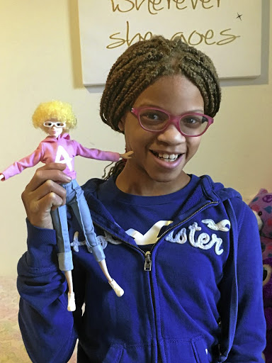 Chantal Gleason with her Alexa doll, which is part of the Malaville Dolls collection.