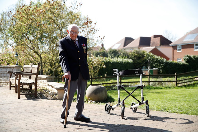 Retired British Army Captain Tom Moore, 99, raises money for health workers by attempting to walk the length of his garden one hundred times before his 100th birthday this month as the spread of coronavirus disease (COVID-19) continues, Marston Moretaine, Britain, April 15, 2020.