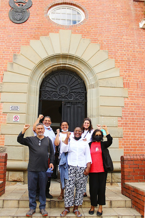 Activists outside the high court in Makhanda on Tuesday after Judge Gerald Bloem’s interdicted Shell from undertaking seismic survey operations until environmental authorisation has been granted. From left: Michael Naidoo (Coastal Justice Network), Chief Dean Spandeel (Chairman, Eastern Cape Khoisan Fishers), Delene Spandeel (EC Khoisan Fishers), Buhle Francis (CJN), Taryn Pereira (CJN) and Esther Ramani (CJN)..