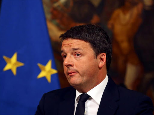 Italian Prime Minister Matteo Renzi looks on during a media conference after a referendum on constitutional reform at Chigi palace in Rome, Italy, December 5, 2016. /REUTERS