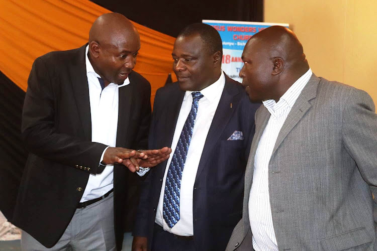 Kakamega Deputy Governor Ayub Savula, Lurambi MP Titus Khamala and Kakamega Inter-Faith Pastors Sssociation Bishop Nicholas Olumasai at Jesus Wonders Victory Church in Sichirai, Lurambi, on Sunday