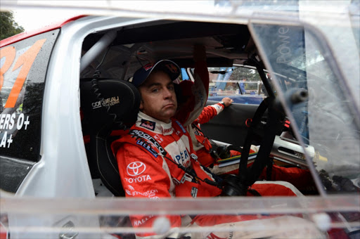 FILE PICTURE: MPUMALANGA, SOUTH AFRICA - APRIL 19: Giniel de Villiers at the start during day 2 of the 2013 Sasol Rally in Mpumalanga on April 19, 2013 in Mpumalanga, South Africa. (Photo by Duif du Toit/Gallo Images)