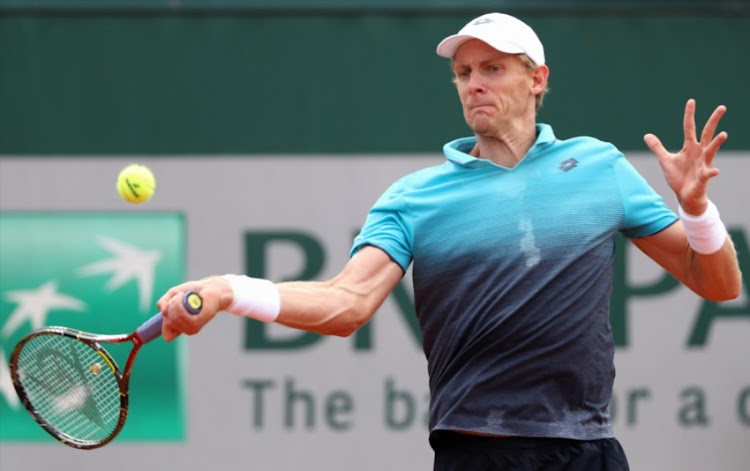 Kevin Anderson of South Africa plays a forehand during the mens singles third round match against Mischa Zverev of Germany during day seven of the 2018 French Open at Roland Garros on June 2, 2018 in Paris, France.