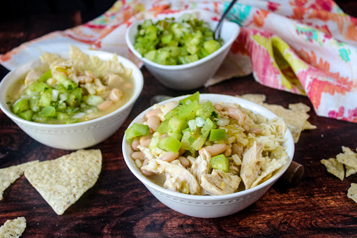 Bowls of White Chicken Chili With Salsa Verde.