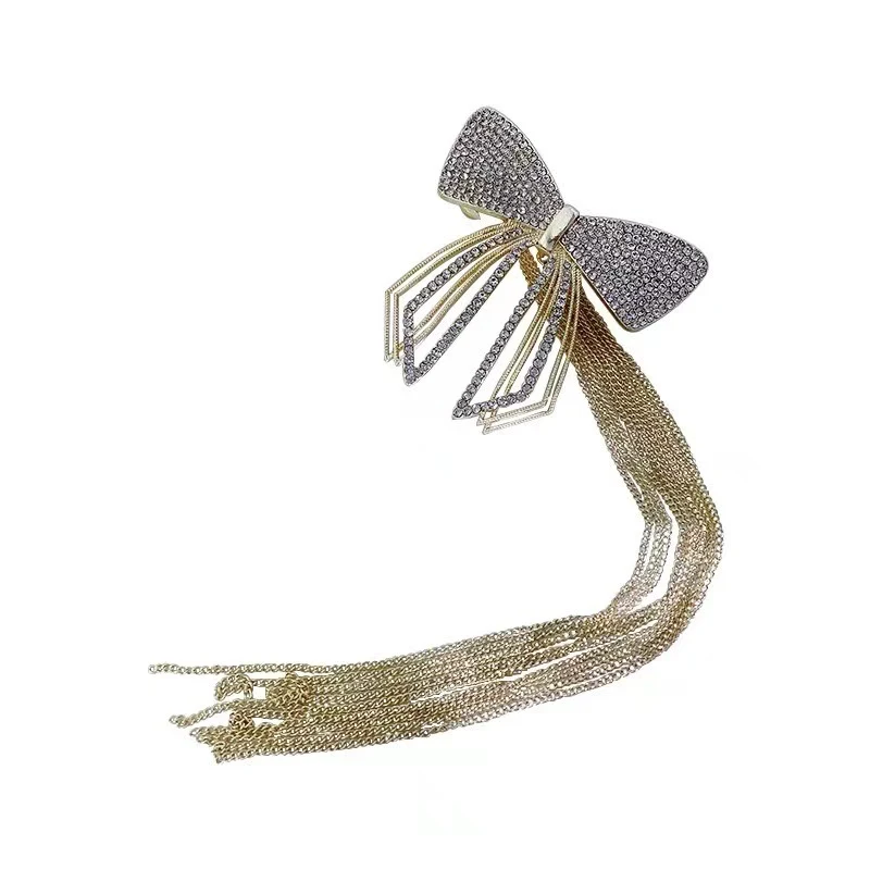 Épingle à cheveux femme en alliage de zinc avec nœud et pompon, accessoire de mode pour cheveux, idéal pour coiffures.