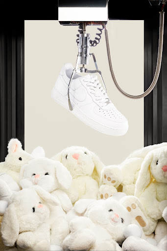 A claw machine grabbing a white Nike Air Force 1 surrounded by white bunny dolls.