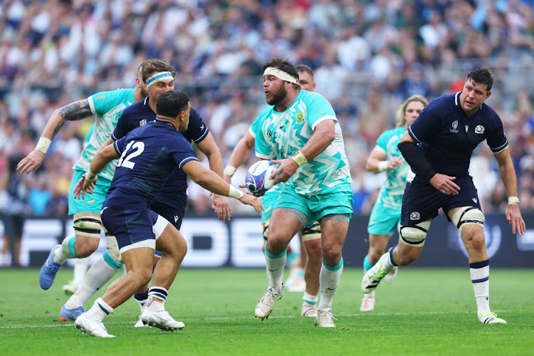 Frans Malherbe of Springboks plays a pass ahead of Jamie Ritchie and Sione Tuipulotu of Scotland during the Rugby World Cup 2023 match between South Africa and Scotland at Stade Velodrome in Marseille, France, September 10 2023. Picture: CAMERON SPENCER/GETTY IMAGES