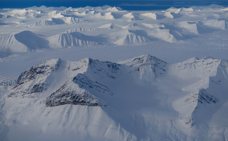 A general view of snowcapped mountains of the arctic landscape near Longyearbyen, Svalbard, Norway, on April 5 2023. Picture: LISI NIESNER/REUTERS