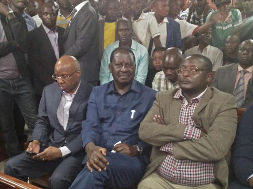 NASA leader Raila Odinga with businessman Jimmy Wanjigi, Vihiga senator George Khaniri at the Milimani law court on Monday, February 5, 2018. /CAROLE MAINA